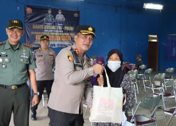 SINERGITAS TNI-POLRI GELAR KEGIATAN BAKSOS, DAN BANSOS DI AREA PASAR DESA MUDAL